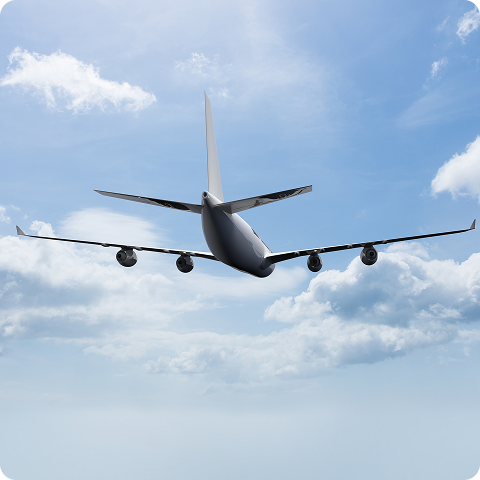 plane-flying-with-clouds-background (1) 1 (1)